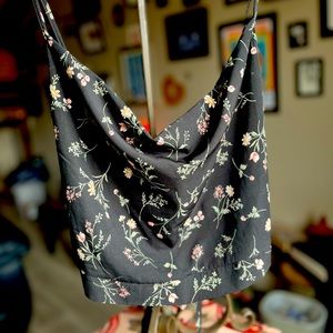 Revamped size M cropped camisole. Please note, this top fits more like a small.